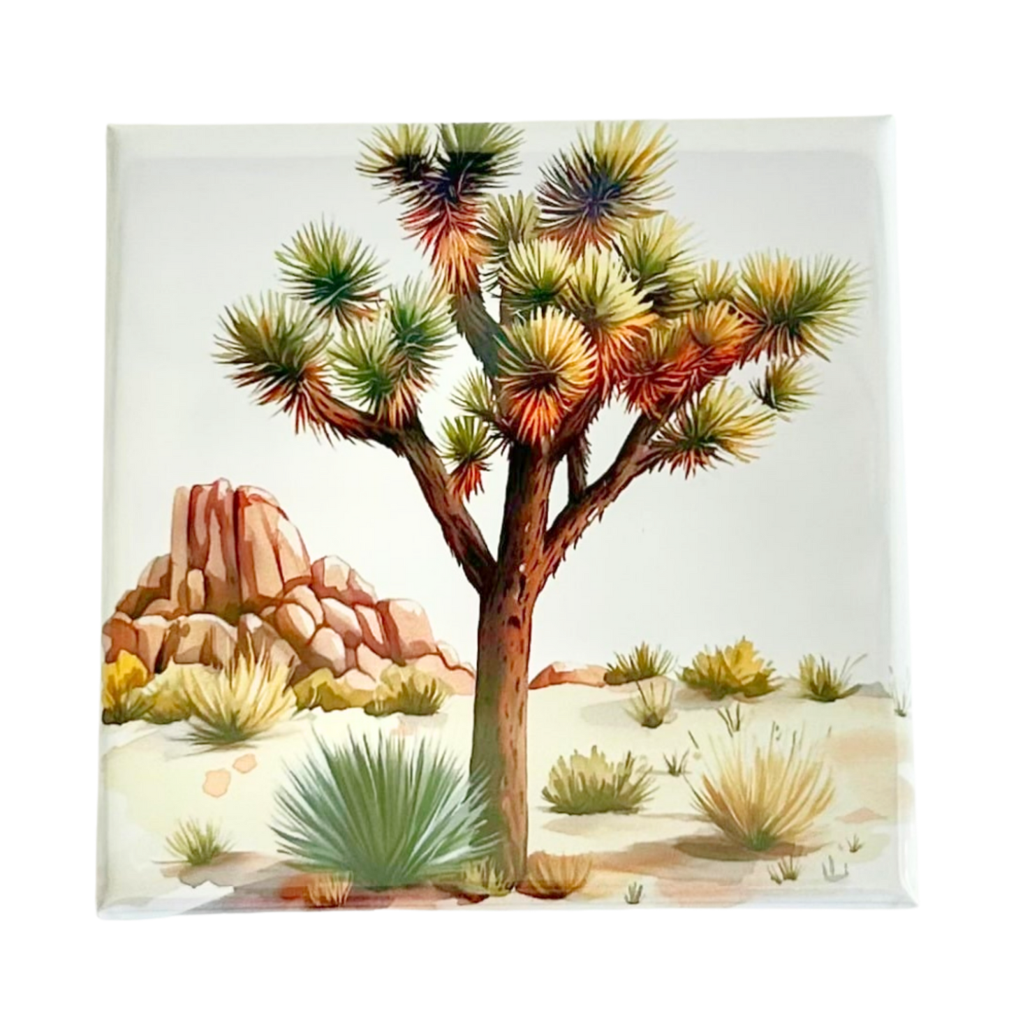 Joshua Tree watercolor magnet featuring a single Joshua tree with desert scrub and red rock formations