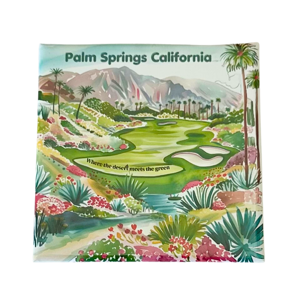 A square magnet featuring a colorful watercolor illustration of a Palm Springs California golf course landscape with mountains, palm trees, and the text 'Palm Springs California' and 'Where the desert meets the green'.