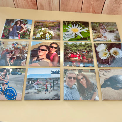 Collection of photographs displayed on a wooden surface