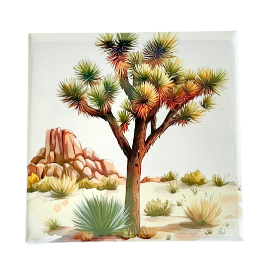 Joshua Tree watercolor magnet featuring a single Joshua tree with desert scrub and red rock formations