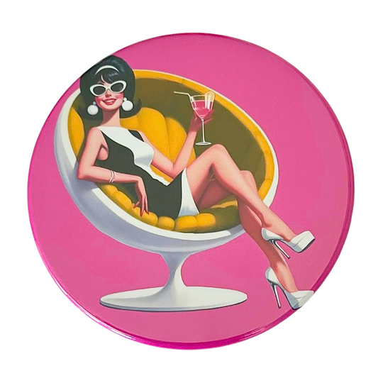 Mid-century pin-up woman in cat-eye sunglasses lounging in a yellow ball chair holding a glass of rosé, vivid hot pink background, retro cocktail hour coaster