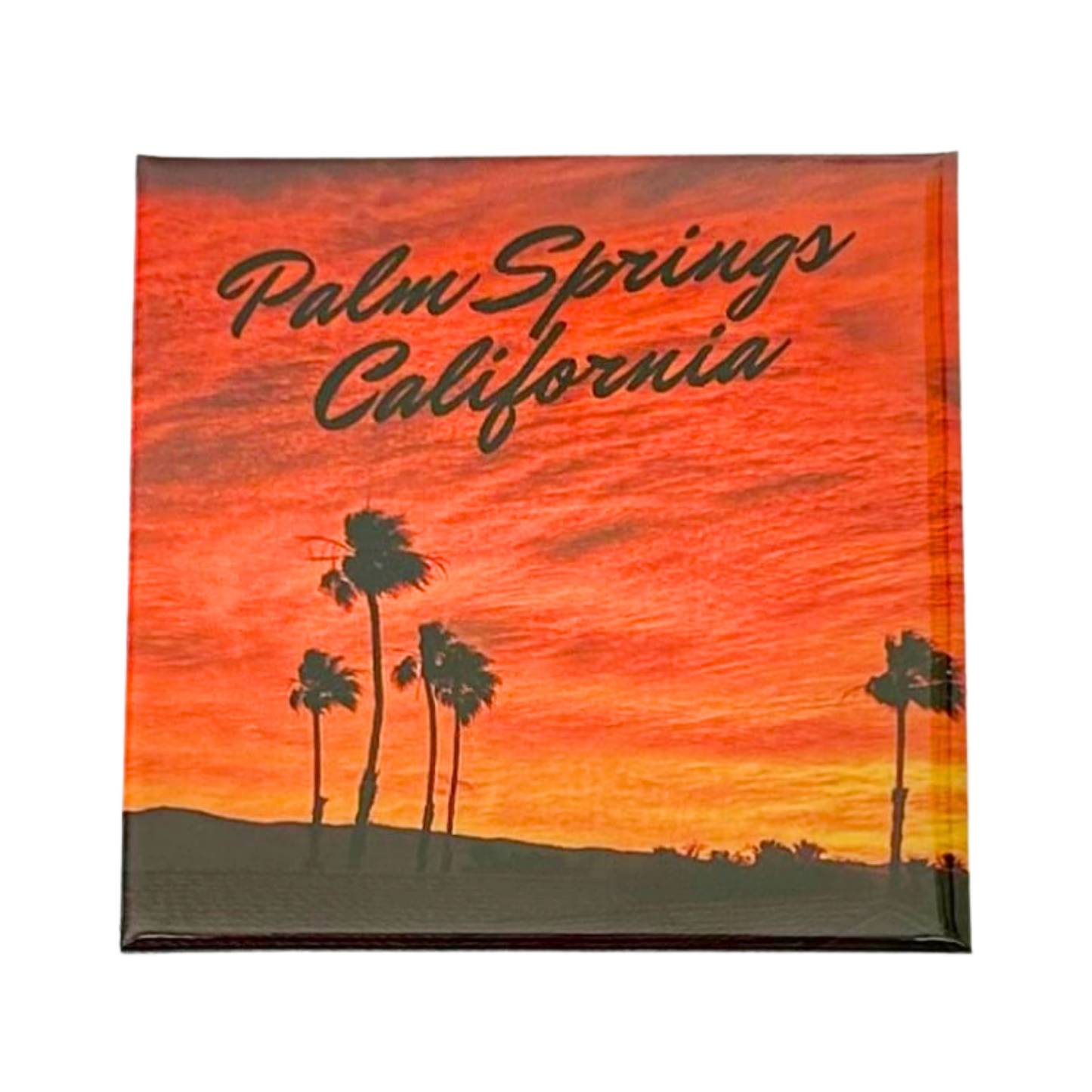 Palm Springs desert sunset magnet with warm orange sky and palm tree silhouettes, California souvenir