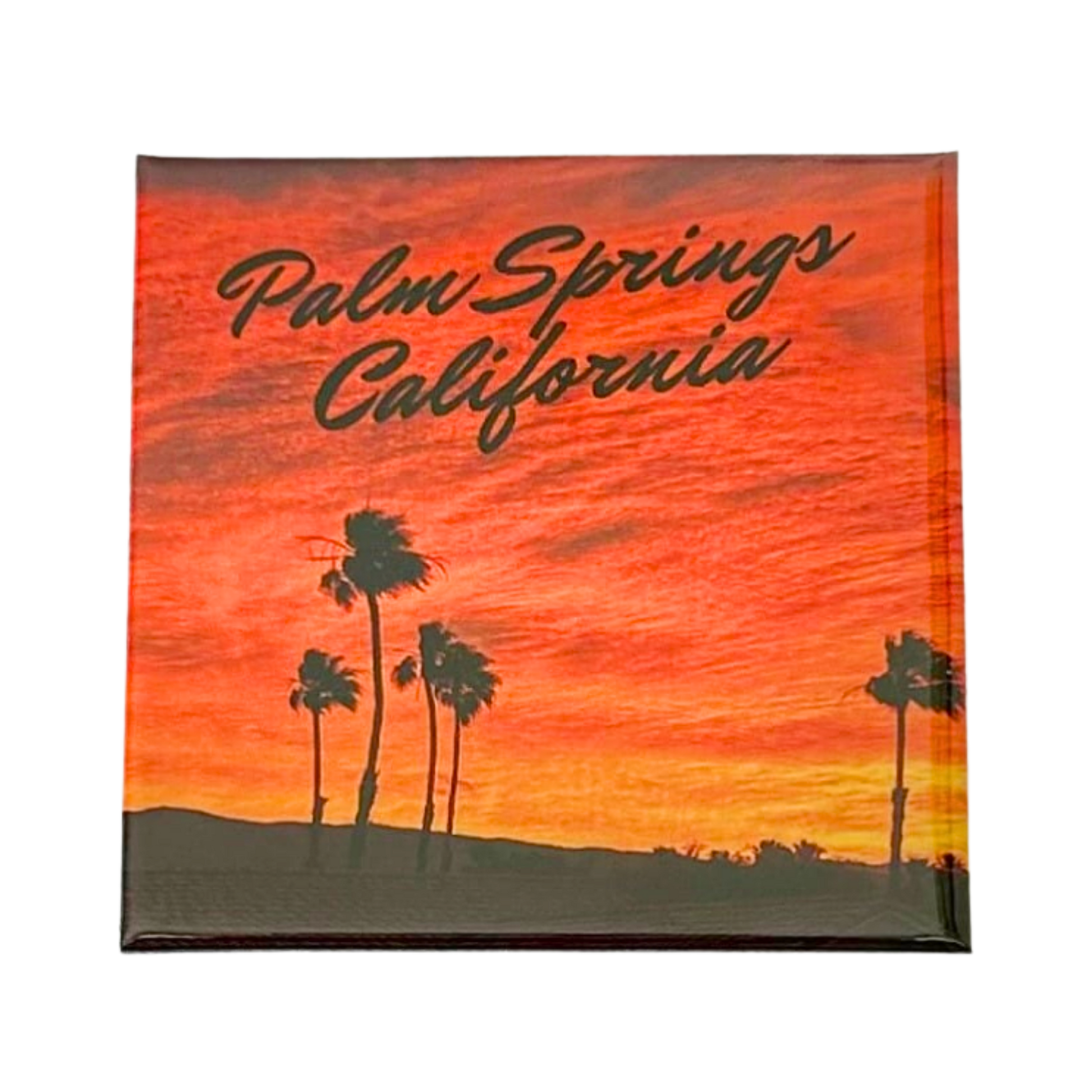 Palm Springs desert sunset magnet with warm orange sky and palm tree silhouettes, California souvenir